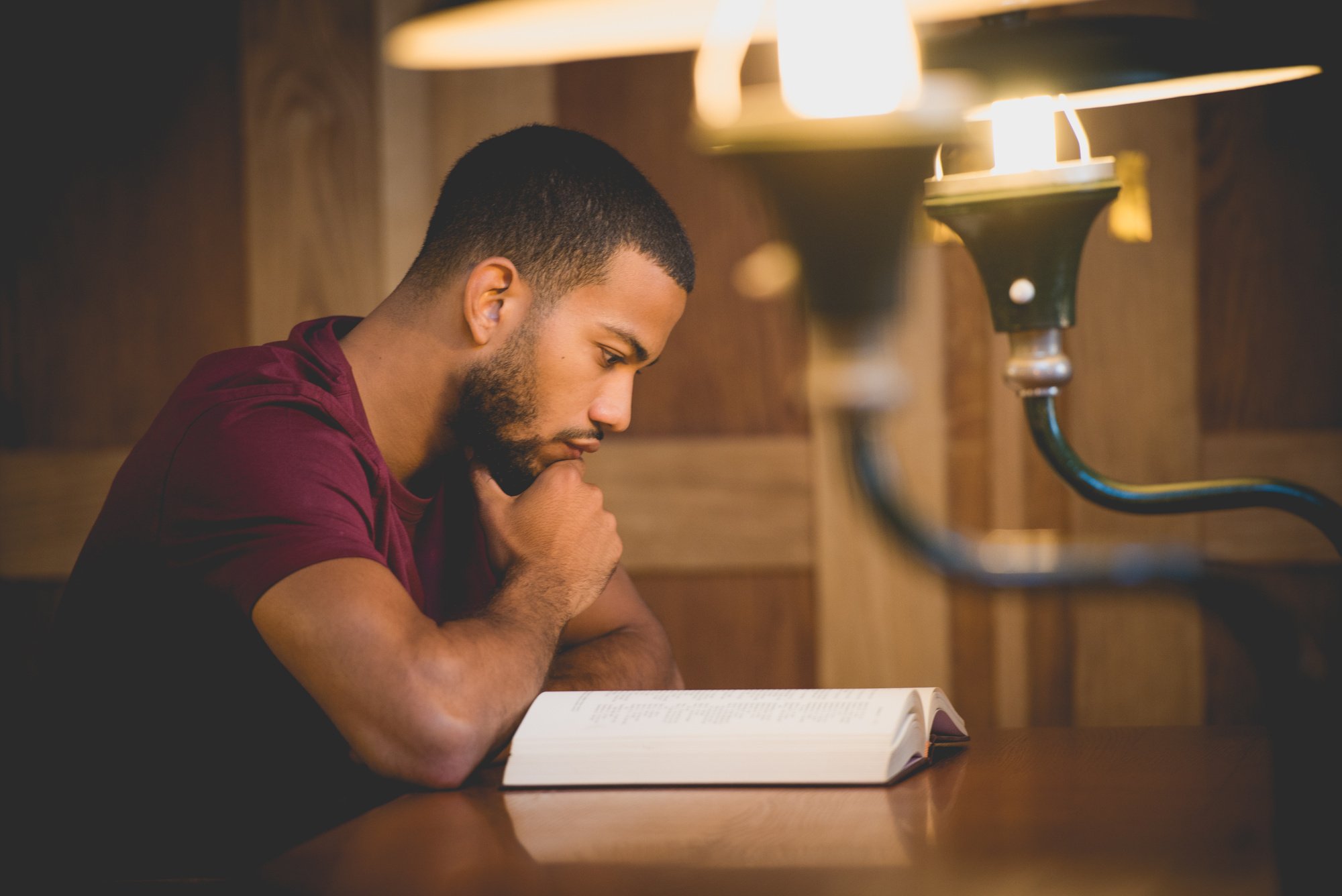 Young man reading book